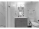 Bathroom features gray vanity, square mirror, and modern fixtures at 8020 E Thomas Rd # 313, Scottsdale, AZ 85251