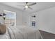 Bedroom with a ceiling fan and a window at 8020 E Thomas Rd # 313, Scottsdale, AZ 85251