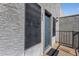 View of building's front door with door mat at 8020 E Thomas Rd # 313, Scottsdale, AZ 85251
