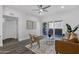 Bright living room with wood floors, contemporary decor, and access to a balcony at 8020 E Thomas Rd # 313, Scottsdale, AZ 85251