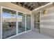 Covered patio area features sliding glass doors opening to dining area at 8020 E Thomas Rd # 313, Scottsdale, AZ 85251