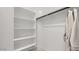 Walk-in closet with shelving and clothing rod, providing ample storage space at 8149 E Petunia Ave # 1060, Mesa, AZ 85212
