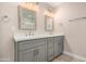 Stylish bathroom featuring a double sink vanity with modern fixtures and framed mirrors at 8713 E Citrus Way, Scottsdale, AZ 85250