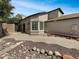 Lovely backyard featuring well-kept landscaping and a paved patio area at 8831 N 63Rd Dr, Glendale, AZ 85302