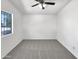 Clean, bright bedroom with neutral carpeting and ample natural light at 8831 N 63Rd Dr, Glendale, AZ 85302