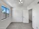 Cozy bedroom features vaulted ceiling, large window and plenty of natural light at 8831 N 63Rd Dr, Glendale, AZ 85302