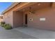 Covered back patio with ceiling fan and neutral paint at 9 S 195Th Ln, Buckeye, AZ 85326