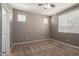 Cozy bedroom with natural light and a ceiling fan at 9 S 195Th Ln, Buckeye, AZ 85326