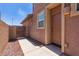 Warm-toned exterior with gated access at 9 S 195Th Ln, Buckeye, AZ 85326