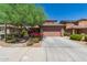 Charming single Gathering home features a well-manicured yard and a two-car garage at 9 S 195Th Ln, Buckeye, AZ 85326