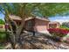 A cozy home featuring a lovely garden and an attached two-car garage at 9 S 195Th Ln, Buckeye, AZ 85326