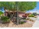 Inviting home featuring a well-maintained lawn and an attached two-car garage at 9 S 195Th Ln, Buckeye, AZ 85326