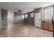 Spacious living area featuring tile flooring and a ceiling fan at 9 S 195Th Ln, Buckeye, AZ 85326