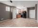 Open floor plan with black appliances and tile flooring at 9 S 195Th Ln, Buckeye, AZ 85326