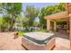 Backyard showing a hot tub and view of the lake at 941 N Benson Ln, Chandler, AZ 85224