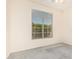 This bedroom is well lit with a big window looking out onto landscaping and greenery at 941 N Benson Ln, Chandler, AZ 85224
