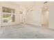 Spacious open-concept living room with arched doorways and large windows at 941 N Benson Ln, Chandler, AZ 85224