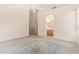 Bright primary bedroom with vaulted ceilings and an ensuite bathroom at 941 N Benson Ln, Chandler, AZ 85224
