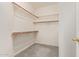 Spacious walk-in closet featuring shelving and rod storage space at 941 N Benson Ln, Chandler, AZ 85224