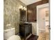 Stylish powder room with unique tile accents and a modern vessel sink at 11124 N 138Th Way, Scottsdale, AZ 85259