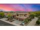 Spacious two-story home with tile roof and three-car garage in a well-maintained neighborhood with mountain views at 11124 N 138Th Way, Scottsdale, AZ 85259