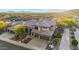 Expansive home with three car garage, desert landscaping and mountain views at 11124 N 138Th Way, Scottsdale, AZ 85259