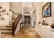 Inviting foyer featuring tile floors, a staircase, and double front doors at 11124 N 138Th Way, Scottsdale, AZ 85259