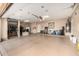 Spacious three car garage with epoxy flooring and storage cabinets at 11124 N 138Th Way, Scottsdale, AZ 85259