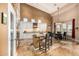 Modern kitchen featuring stainless steel appliances, custom cabinets, and a breakfast bar at 11124 N 138Th Way, Scottsdale, AZ 85259