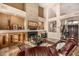 Bright living room with stone fireplace and comfortable seating at 11124 N 138Th Way, Scottsdale, AZ 85259