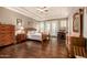 Spacious bedroom with hardwood floors and tray ceilings at 11124 N 138Th Way, Scottsdale, AZ 85259