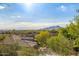 Enjoy breathtaking mountain views from this property, surrounded by lush desert landscape and upscale neighborhood at 11124 N 138Th Way, Scottsdale, AZ 85259