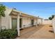 Enjoy outdoor living with a covered patio and low-maintenance gravel landscaping at 1122 E Michelle Dr, Phoenix, AZ 85022