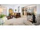 Open-concept living area with plush seating, seamless flow to the dining area, and inviting ambiance at 1122 E Michelle Dr, Phoenix, AZ 85022