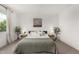 Bright and airy primary bedroom with large window and plants at 12289 E Ballentine Rd, Gold Canyon, AZ 85118