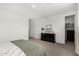 Neutral primary bedroom with black dresser and walk-in closet at 12289 E Ballentine Rd, Gold Canyon, AZ 85118
