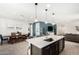 Open concept kitchen with quartz countertops and stainless steel appliances at 12289 E Ballentine Rd, Gold Canyon, AZ 85118