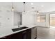 Bright kitchen with modern finishes, stainless steel appliances, and stylish pendant lighting at 12289 E Ballentine Rd, Gold Canyon, AZ 85118