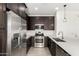 Well-equipped kitchen with stainless steel appliances and a breakfast bar at 12289 E Ballentine Rd, Gold Canyon, AZ 85118