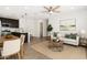 Inviting living room with a stylish sofa, dining area, and modern kitchen at 12289 E Ballentine Rd, Gold Canyon, AZ 85118