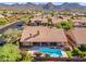 Home with a private pool and manicured desert landscaping at 12605 E Kalil Dr, Scottsdale, AZ 85259