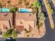 Birds eye view of a residence and its private pool, complemented by meticulous desert landscaping at 12605 E Kalil Dr, Scottsdale, AZ 85259
