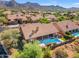Aerial view of home with a backyard pool and desert landscape at 12605 E Kalil Dr, Scottsdale, AZ 85259