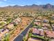 Scenic view of a neighborhood in the desert near the mountains at 12605 E Kalil Dr, Scottsdale, AZ 85259
