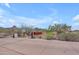 Community sign with desert landscaping creating a welcoming entrance to the neighborhood at 12605 E Kalil Dr, Scottsdale, AZ 85259