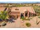 Charming single-story home with landscaped desert yard and barrel tile roof at 12605 E Kalil Dr, Scottsdale, AZ 85259