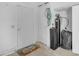 Well-kept garage features neutral walls and includes a water softener at 12605 E Kalil Dr, Scottsdale, AZ 85259