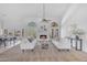 Elegant living room with a cozy fireplace, neutral decor, and ample natural light at 12605 E Kalil Dr, Scottsdale, AZ 85259