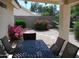 Enjoy the tranquil outdoor space with a patio and well-maintained yard with colorful flowers at 1333 N Higley Rd # 7, Mesa, AZ 85205