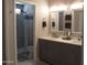 Bathroom boasts a double sink vanity, neutral color palette and walk-in shower at 1333 N Higley Rd # 7, Mesa, AZ 85205